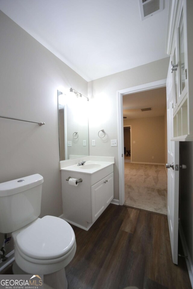 262 Devynwood Ln, Dallas, GA 30157 - half bathroom with vanity and wood finished floors