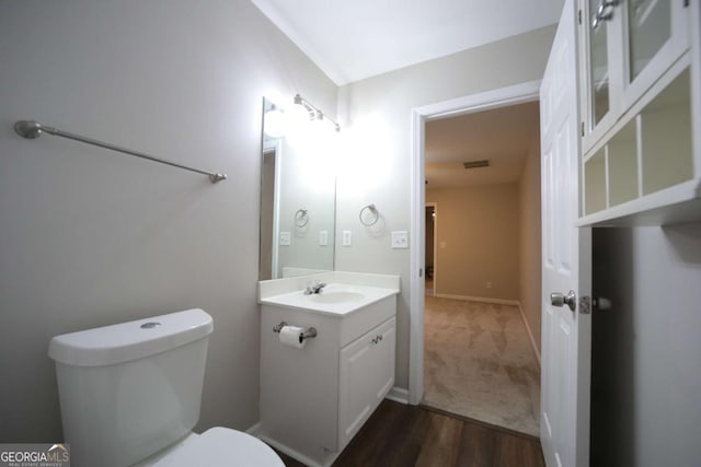 262 Devynwood Ln, Dallas, GA 30157 - half bath featuring vanity and wood finished floors