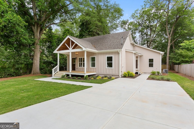 1036 Dell Ave SE, Smyrna, GA 30080 - modern farmhouse style home featuring a porch, a shingled roof, and board and batten siding