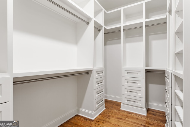 1036 Dell Ave SE, Smyrna, GA 30080 - walk in closet with wood finished floors