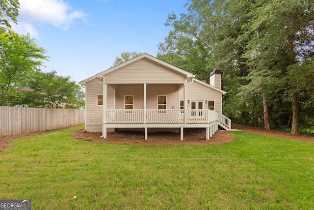 1036 Dell Ave SE, Smyrna, GA 30080 - view of front facade with a chimney and a wooden deck