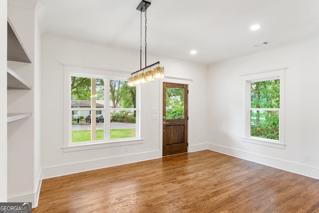 1036 Dell Ave SE, Smyrna, GA 30080 - foyer entrance with wood finished floors, recessed lighting, baseboards, crown molding, and a chandelier