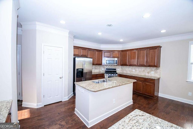3020 Whitfield Ave, Cumming, GA 30040 - kitchen featuring stainless steel appliances, dark wood-type flooring, tasteful backsplash, an island with sink, and ornamental molding