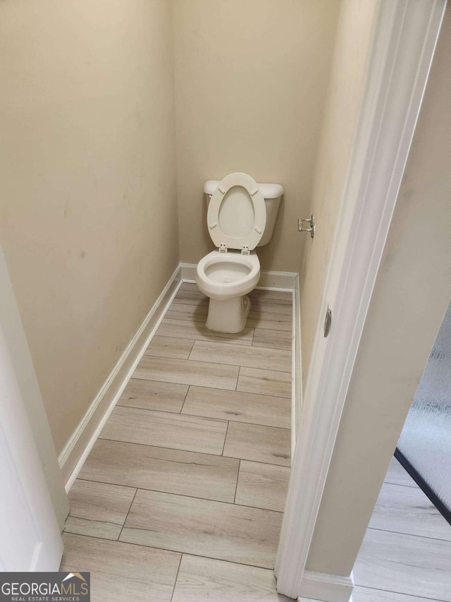 3020 Whitfield Ave, Cumming, GA 30040 - bathroom with toilet and wood tiled floors