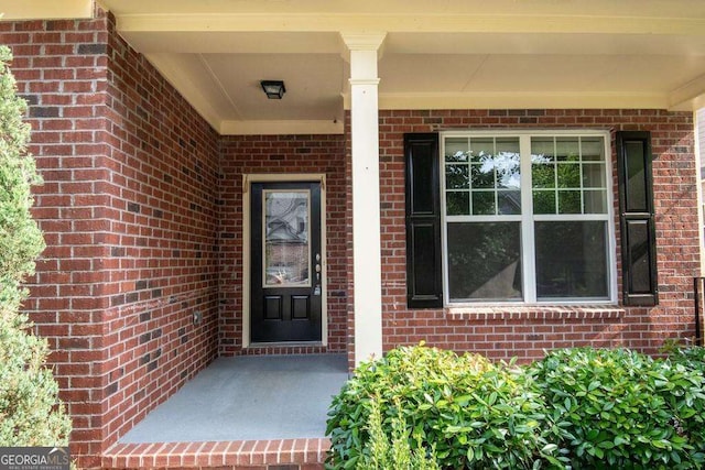 3020 Whitfield Ave, Cumming, GA 30040 - property entrance featuring brick siding and covered porch