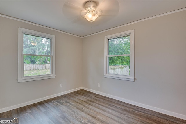 2325 Henry Cir, Augusta, GA 30906 - empty room with plenty of natural light, ornamental molding, wood finished floors, baseboards, and a ceiling fan