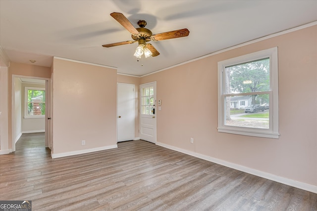 2325 Henry Cir, Augusta, GA 30906 - spare room featuring healthy amount of natural light, light wood-style floors, baseboards, and ornamental molding