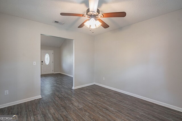 755 Madison Dr, Hinesville, GA 31313 - unfurnished room featuring ceiling fan, dark wood finished floors, baseboards, and a textured ceiling