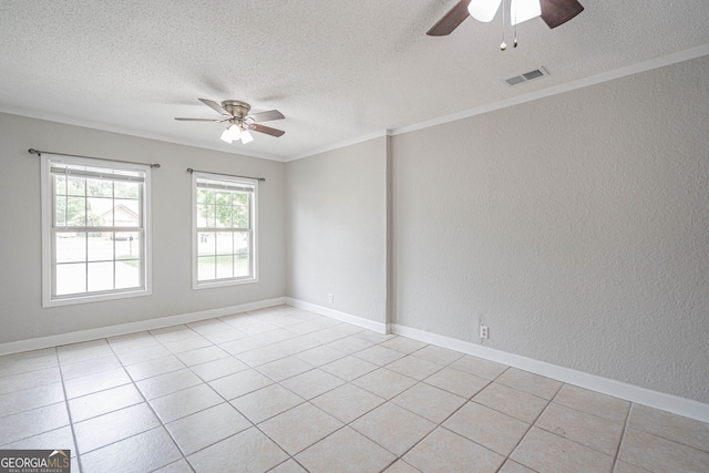 755 Madison Dr, Hinesville, GA 31313 - empty room with a ceiling fan, a textured ceiling, a textured wall, light tile patterned floors, and crown molding