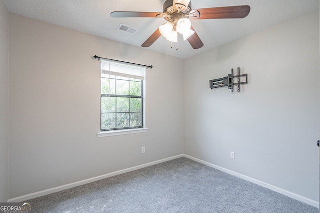 755 Madison Dr, Hinesville, GA 31313 - unfurnished room with ceiling fan, carpet, baseboards, and a textured ceiling