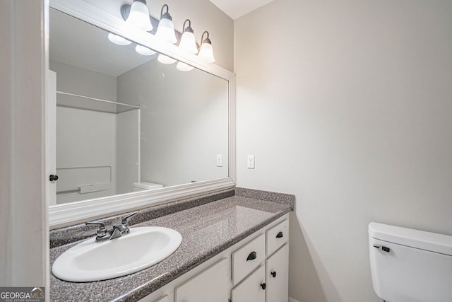 755 Madison Dr, Hinesville, GA 31313 - full bathroom featuring toilet, vanity, and a shower