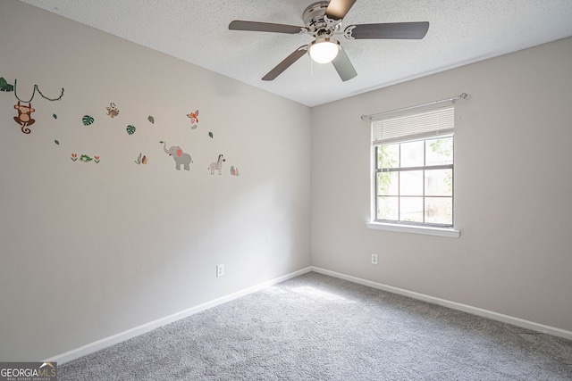 755 Madison Dr, Hinesville, GA 31313 - carpeted spare room with ceiling fan, a textured ceiling, and baseboards