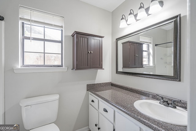 755 Madison Dr, Hinesville, GA 31313 - bathroom with vanity, toilet, and a shower