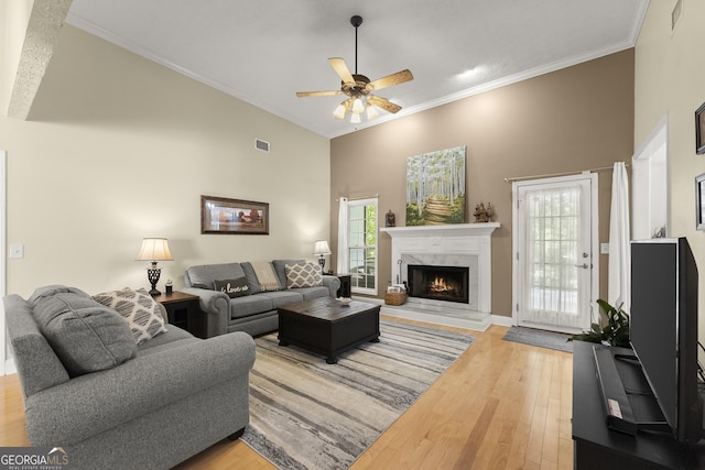 92 Isaiah Dr, Jefferson, GA 30549 - living area with a premium fireplace, wood finished floors, crown molding, and ceiling fan