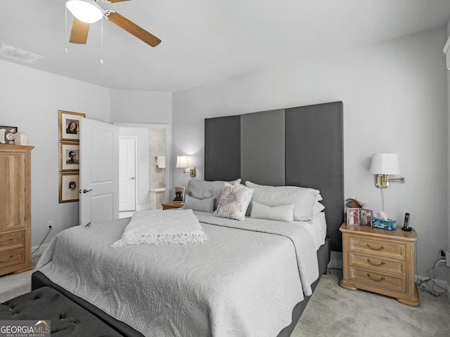 110 Chinkapin Ct, Griffin, GA 30223 - bedroom featuring light colored carpet, ensuite bathroom, and a ceiling fan