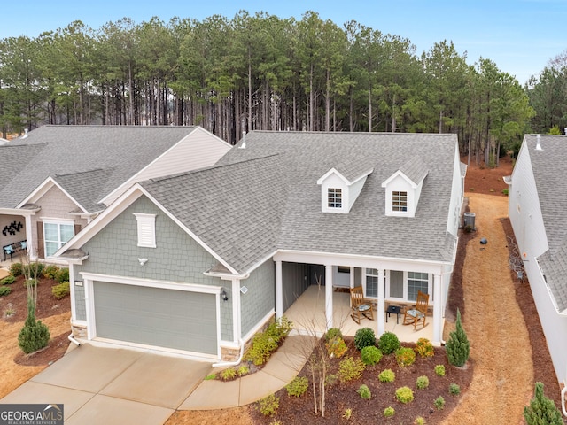 110 Chinkapin Ct, Griffin, GA 30223 - view of front of home featuring roof with shingles, an attached garage, and concrete driveway