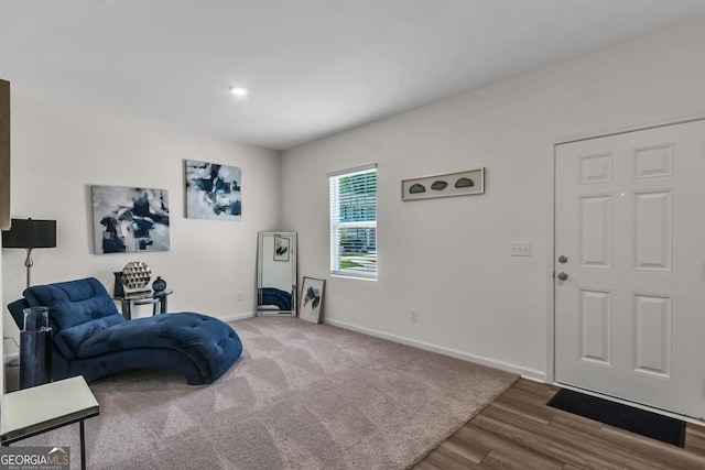 289 Pond Ct, Hoschton, GA 30548 - sitting room featuring baseboards and wood finished floors
