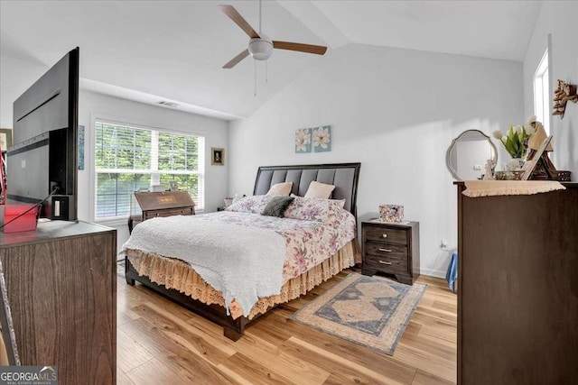 2205 Hoskin Ct NW Unit 9, Kennesaw, GA 30144 - bedroom with lofted ceiling, multiple windows, light wood-style flooring, and ceiling fan