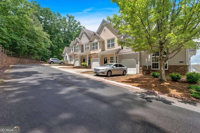 2205 Hoskin Ct NW Unit 9, Kennesaw, GA 30144 - view of front of property featuring stone siding and driveway