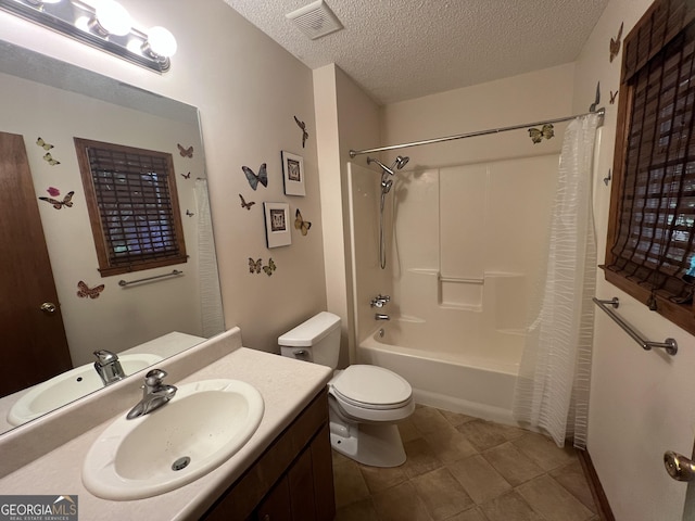 21 Cannon Cir NW, Cartersville, GA 30120 - bathroom featuring a textured ceiling, vanity, toilet, shower / bathtub combination with curtain, and tile patterned floors