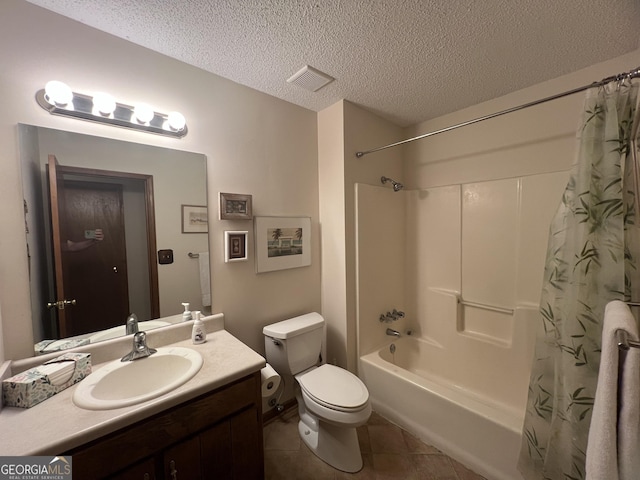 21 Cannon Cir NW, Cartersville, GA 30120 - bathroom with a textured ceiling, tile patterned flooring, shower / bath combo with shower curtain, vanity, and toilet