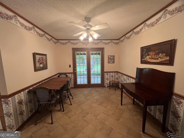 21 Cannon Cir NW, Cartersville, GA 30120 - dining area with a wainscoted wall, a textured ceiling, a ceiling fan, and ornamental molding