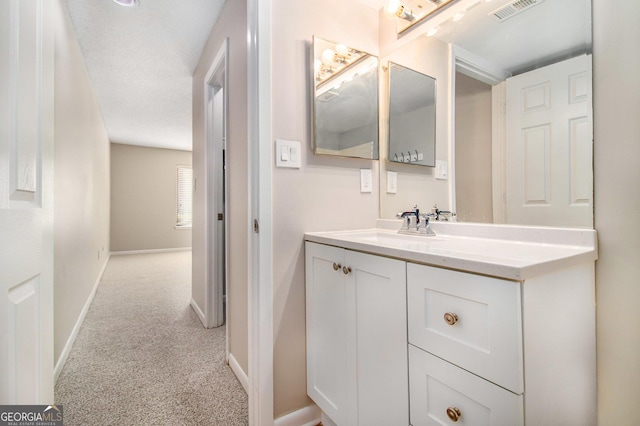 2220 Runnymead Rdg SE, Marietta, GA 30067 - bathroom featuring vanity and baseboards