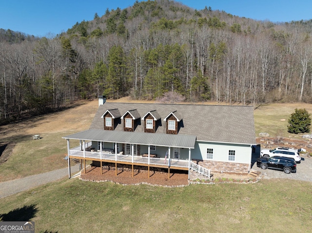 1420 Bridge Creek Rd, Tiger, GA 30576 - view of front of house with a porch, a wooded view, and a front lawn