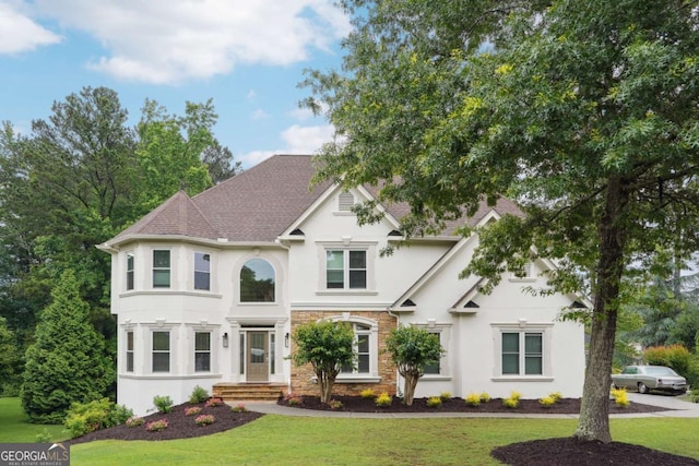 5535 Buck Hollow Dr, Alpharetta, GA 30005 - view of front of home featuring stucco siding, a front yard, and stone siding