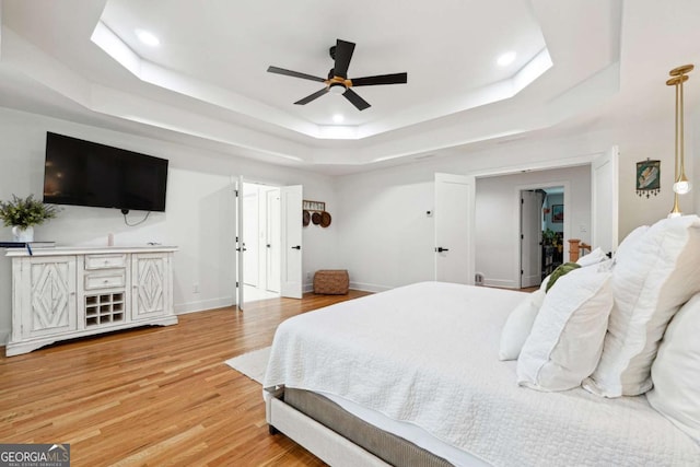 5535 Buck Hollow Dr, Alpharetta, GA 30005 - bedroom with a raised ceiling, light wood-type flooring, recessed lighting, and a ceiling fan