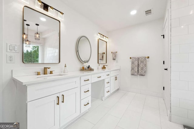 5535 Buck Hollow Dr, Alpharetta, GA 30005 - full bath with double vanity, tile patterned flooring, and recessed lighting