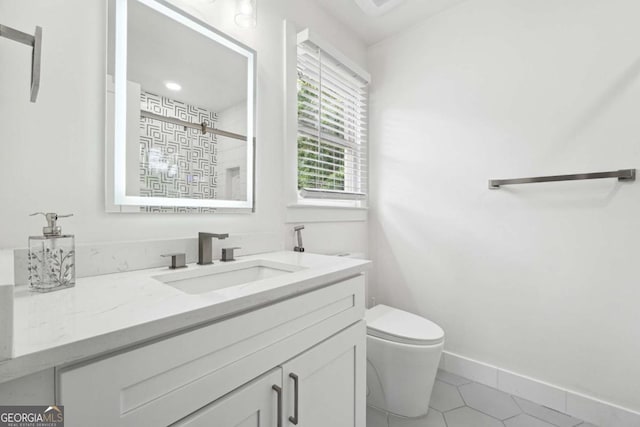 5535 Buck Hollow Dr, Alpharetta, GA 30005 - full bath featuring vanity, tile patterned floors, and tiled shower