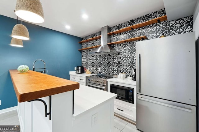 5535 Buck Hollow Dr, Alpharetta, GA 30005 - kitchen with stainless steel appliances, wall chimney exhaust hood, open shelves, decorative backsplash, and white cabinets