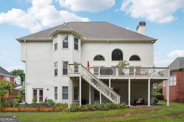 5535 Buck Hollow Dr, Alpharetta, GA 30005 - rear view of house featuring stairway, a wooden deck, a chimney, and a yard