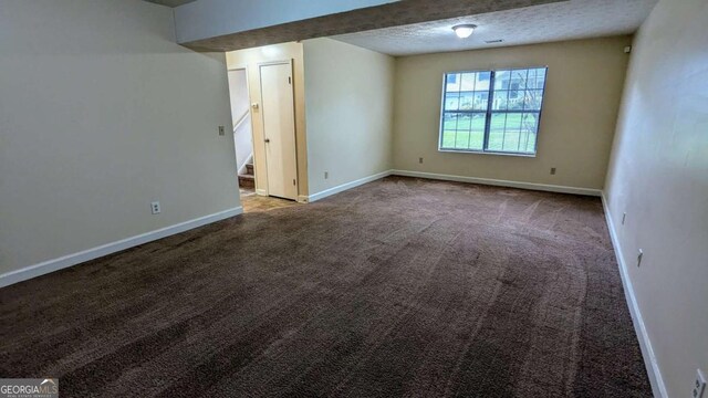 2168 Sara Ashley Way, Lithonia, GA 30058 - carpeted empty room with stairway and baseboards