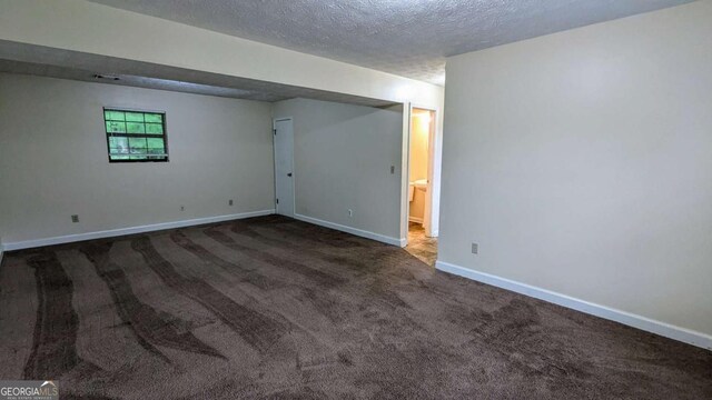 2168 Sara Ashley Way, Lithonia, GA 30058 - unfurnished room with a textured ceiling and carpet flooring