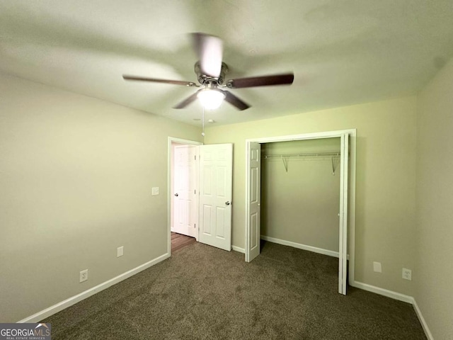 2469 Baywood Dr SE, Atlanta, GA 30315 - unfurnished bedroom featuring dark colored carpet, baseboards, a closet, and ceiling fan