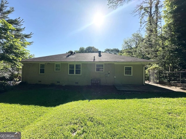 2469 Baywood Dr SE, Atlanta, GA 30315 - back of house with a yard, crawl space, a patio area, and central AC unit