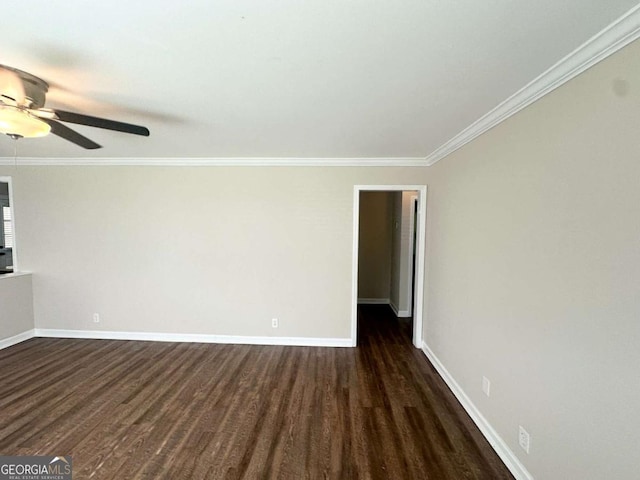 2469 Baywood Dr SE, Atlanta, GA 30315 - unfurnished living room with a ceiling fan, dark wood finished floors, baseboards, and crown molding