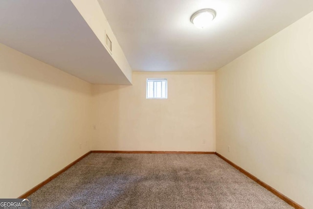 3440 Quinn Ridge Dr, Snellville, GA 30039 - below grade area with carpet and baseboards