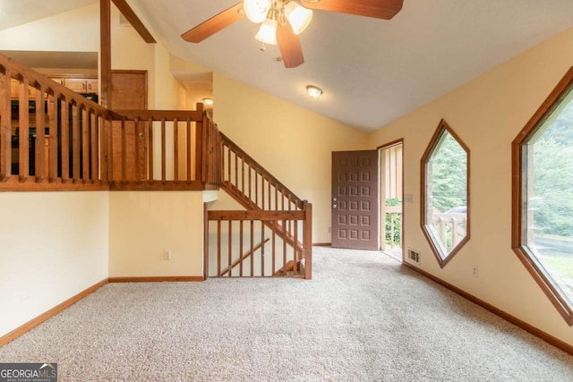 3440 Quinn Ridge Dr, Snellville, GA 30039 - carpeted entrance foyer with lofted ceiling, healthy amount of natural light, and a ceiling fan