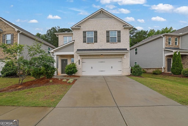 1998 Nuthatch Dr, Hoschton, GA 30548 - view of front of property with brick siding, driveway, a garage, and a front lawn