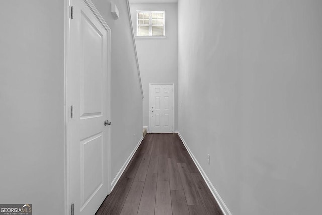 1998 Nuthatch Dr, Hoschton, GA 30548 - hallway with dark wood-style flooring and baseboards
