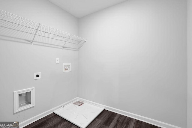 1998 Nuthatch Dr, Hoschton, GA 30548 - laundry area featuring washer hookup, hookup for an electric dryer, dark wood-type flooring, baseboards, and gas dryer hookup