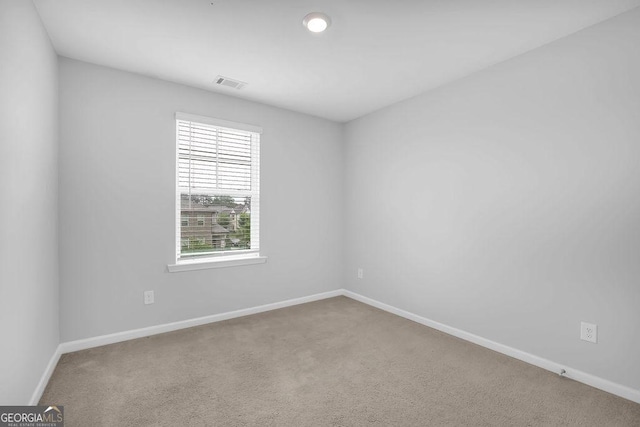 1998 Nuthatch Dr, Hoschton, GA 30548 - carpeted spare room with baseboards