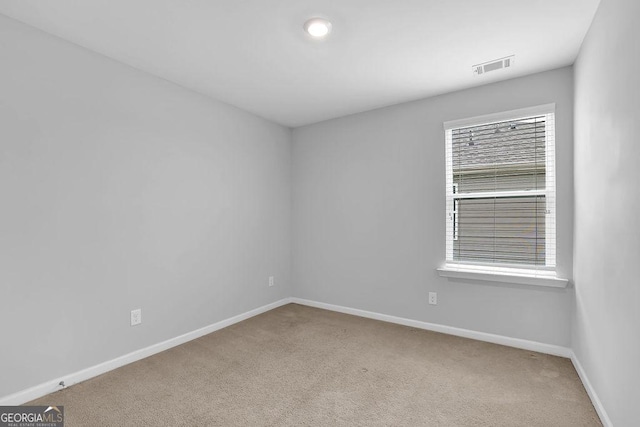 1998 Nuthatch Dr, Hoschton, GA 30548 - carpeted spare room with baseboards