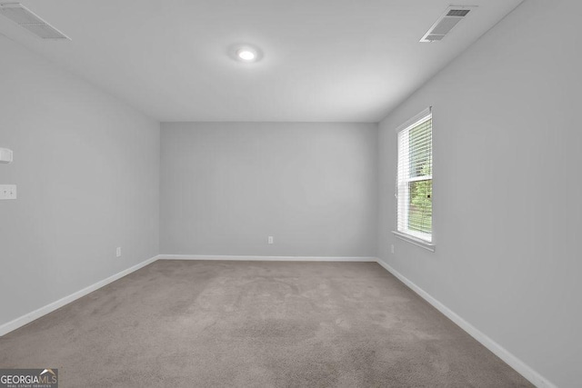 1998 Nuthatch Dr, Hoschton, GA 30548 - carpeted empty room with baseboards