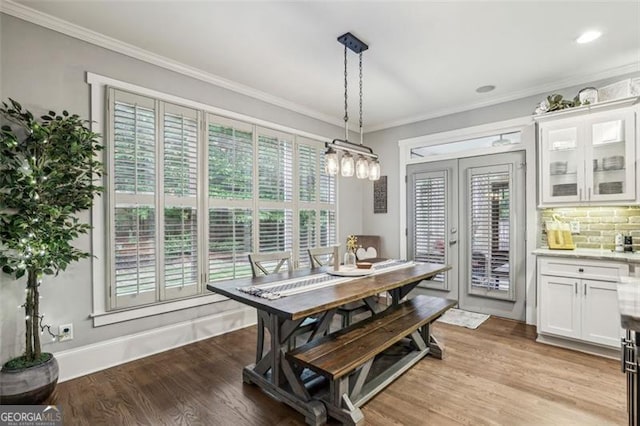 3665 Pennington Rd, Cumming, GA 30041 - dining room with ornamental molding and light wood-style flooring