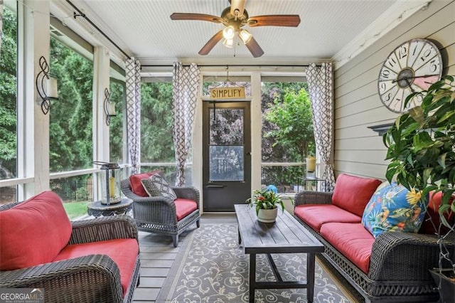 3665 Pennington Rd, Cumming, GA 30041 - sunroom featuring a ceiling fan, an outdoor hangout area, wood finished floors, and wooden walls