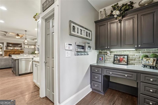 3665 Pennington Rd, Cumming, GA 30041 - kitchen with dishwasher, ornamental molding, open floor plan, tasteful backsplash, and dark wood finished floors